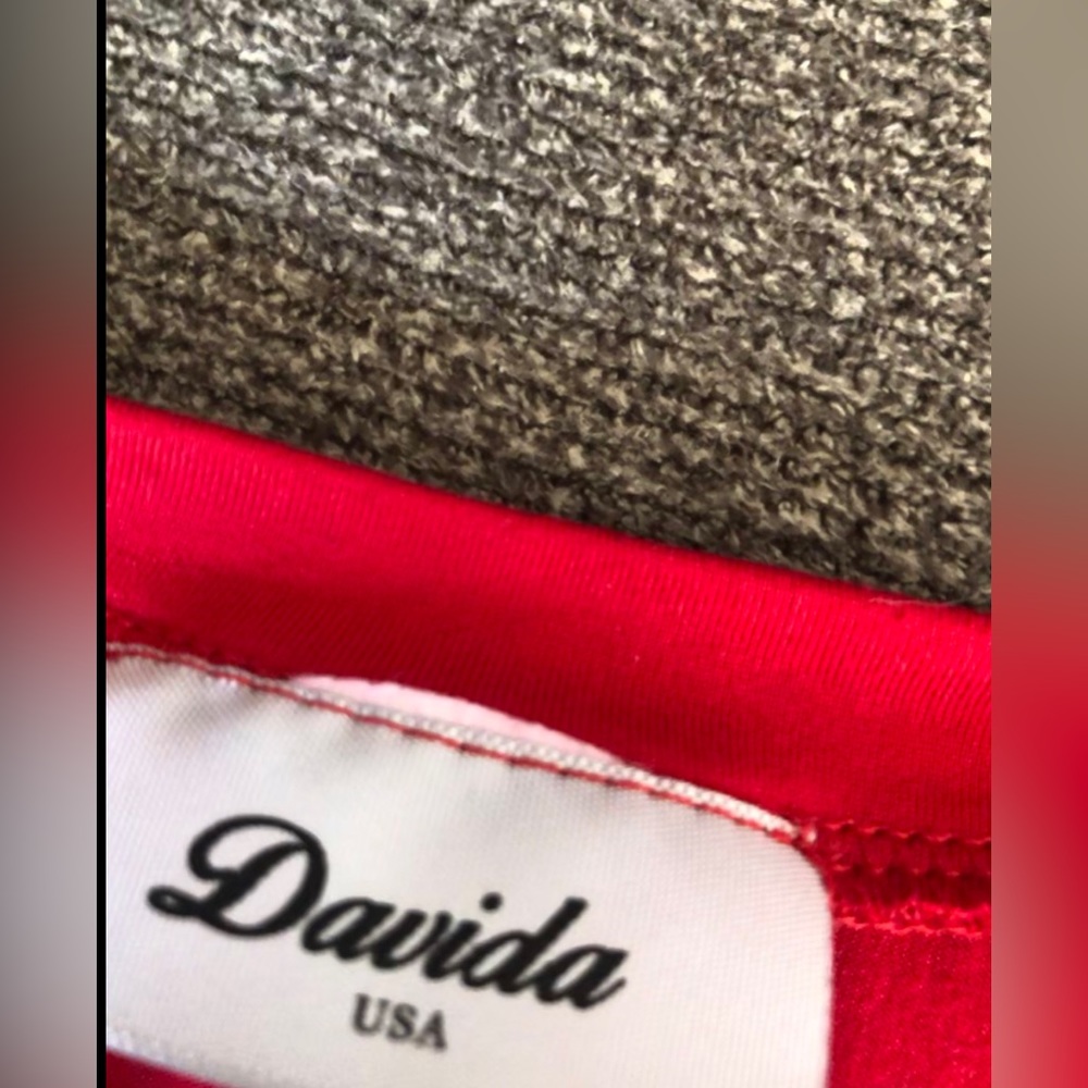 Red blouse, a little thin, size Medium.